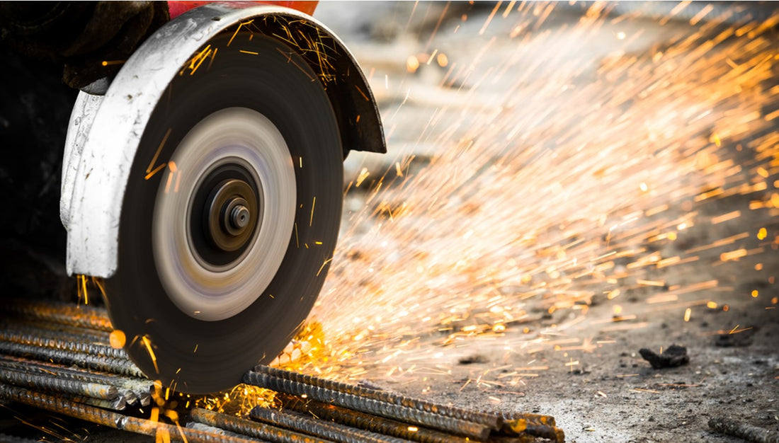 Electrical steel grinding wheel grinding metal bars and shooting sparks