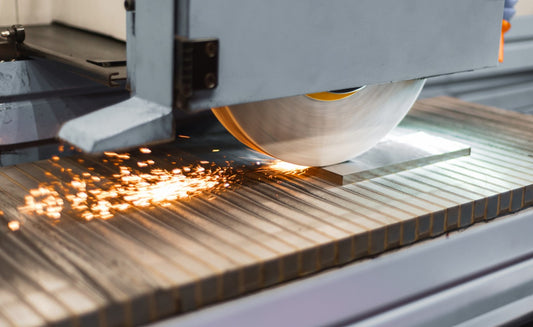 Industrial surface grinding wheel working in machine shop